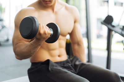 Man exercising in gym