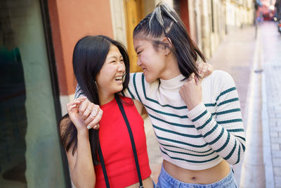 Side view of young woman looking away