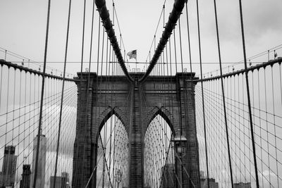 Low angle view of brooklyn bridge against sky