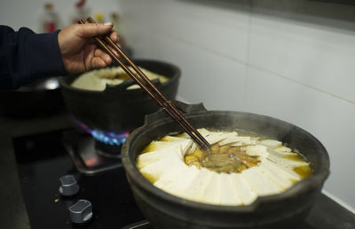 Close-up of hand holding food