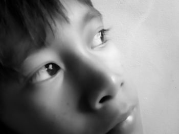 Close-up portrait of boy looking away