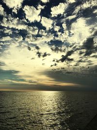 Scenic view of sea against sky at sunset