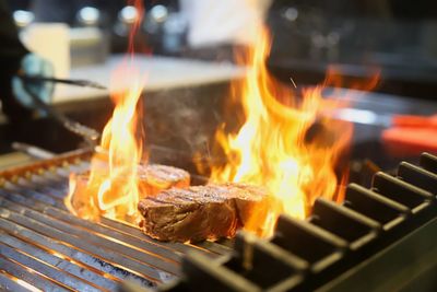 Close-up of fire on barbecue grill