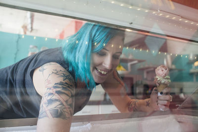 Young woman at ice cream shop.