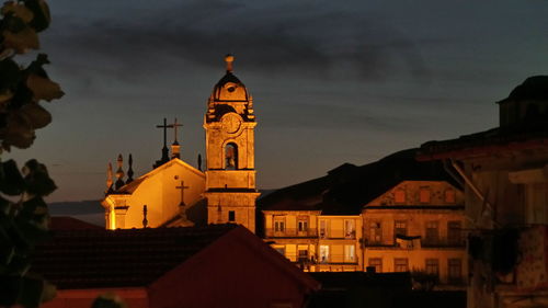 Church in town against sky