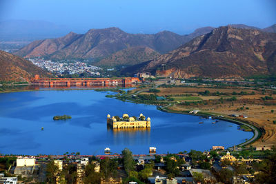 High angle view of jal mahal in lake against mountain