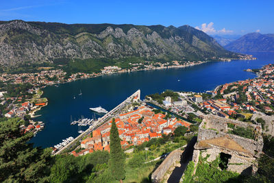 High angle view of city at riverbank