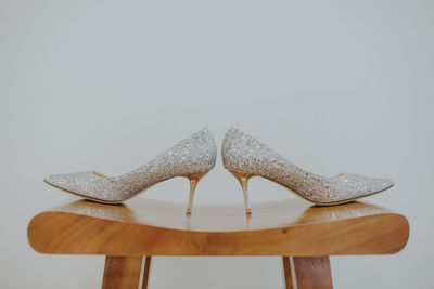 Close-up of pumpkin on table against white background