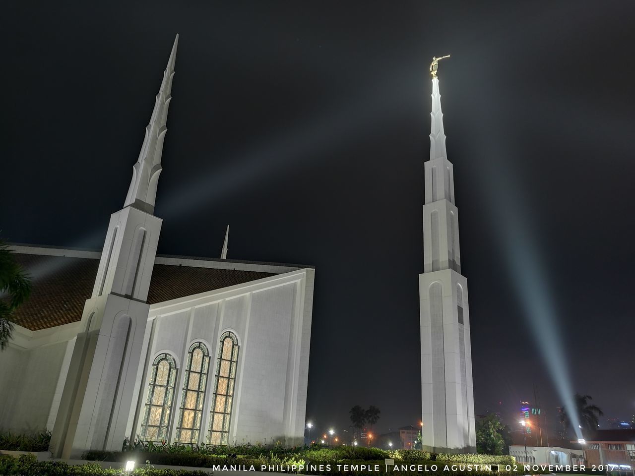 LOW ANGLE VIEW OF ILLUMINATED BUILDING