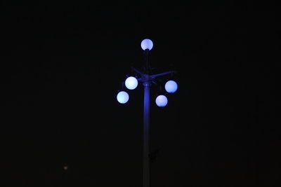 Illuminated lighting equipment against gray background