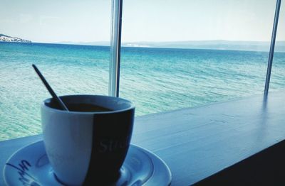 Coffee cup on table