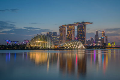 Illuminated buildings in city at night