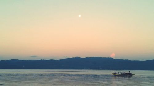 Scenic view of sea at sunset