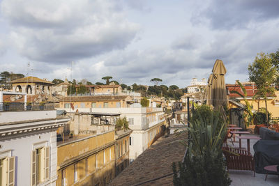 Buildings in city against sky