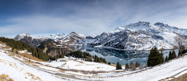 Snow covered mountains against sky