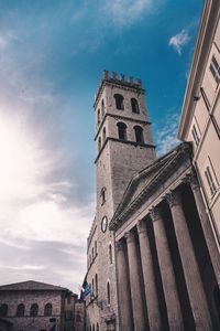 Low angle view of historical building in assisi, italy