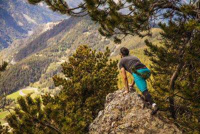 Rear view of man on cliff