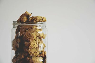 Close-up of cookies against white background