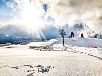Scenic view of snowy landscape against sky