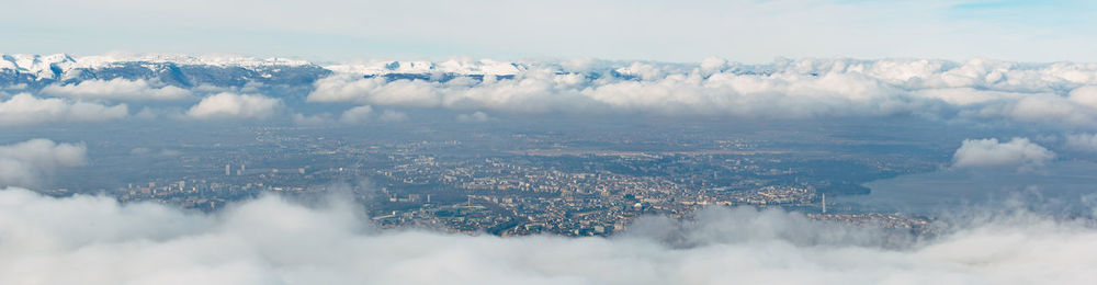 Panoramic shot of cityscape against sky