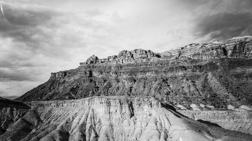 Low angle view of rock formation against sky