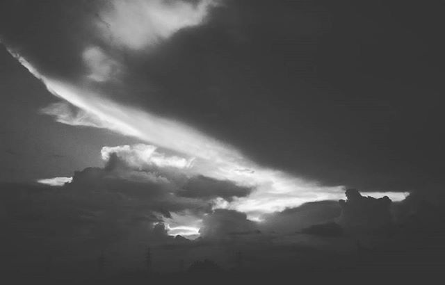 sky, cloud - sky, low angle view, silhouette, cloudy, built structure, architecture, cloud, building exterior, nature, weather, dusk, outdoors, storm cloud, no people, dark, overcast, sunlight, day, beauty in nature