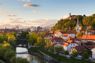 High angle view of river amidst buildings in town