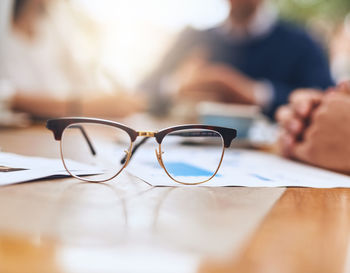 Close-up of eyeglasses on table