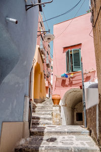 Narrow alley amidst buildings in town