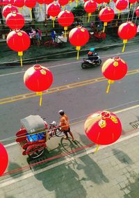 Red balloons on street