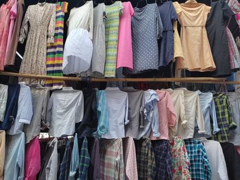Panoramic view of clothes hanging at store