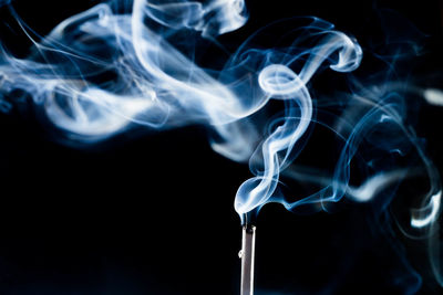 Close-up of smoke against black background