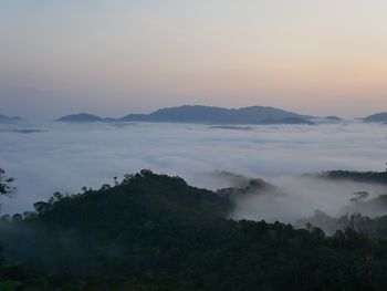 Scenic view of mountains against sky during sunset