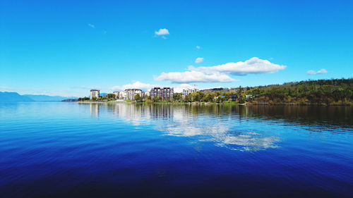 View of swimming pool against blue sky