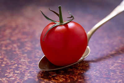 Close-up of cherry tomatoes on table