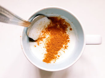 Directly above shot of coffee cup on table