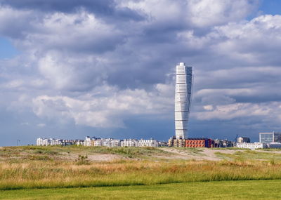 View of famous turning torso skyscraper at malmo by cloudy day, malmo, sweden 