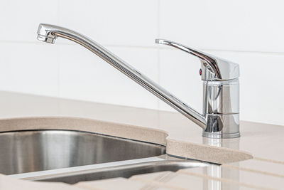 Close-up of a kitchen faucet 