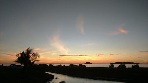 Scenic view of sea at sunset