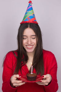 Portrait of smiling young woman