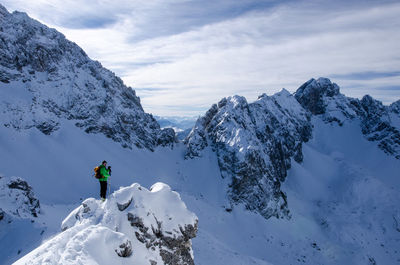 Scenic view of snow covered mountains