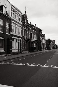 Buildings in city against sky