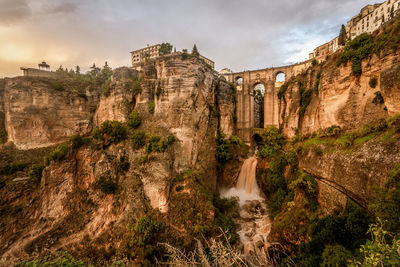 Panoramic view of rock formations against sky