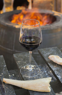 Close-up of wineglass on table