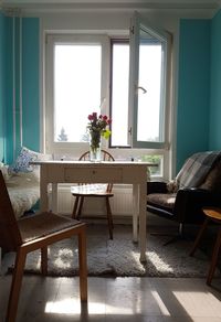 Flower vase on table at home