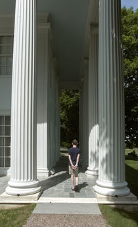 Full length of woman walking in building