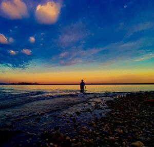 Scenic view of sea at sunset