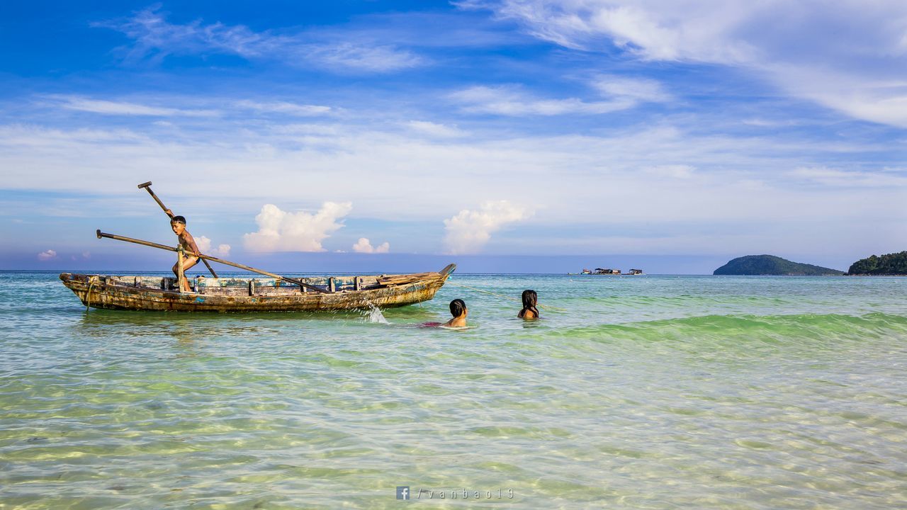 water, sea, nautical vessel, sky, men, transportation, leisure activity, lifestyles, mode of transport, boat, waterfront, cloud - sky, person, travel, nature, horizon over water, vacations, medium group of people, tourist