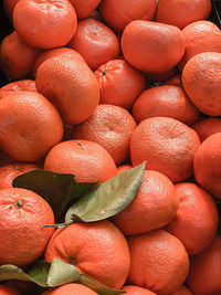 Full frame shot of mandarins for sale at market stall