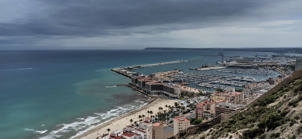 High angle view of crowd at beach against sky